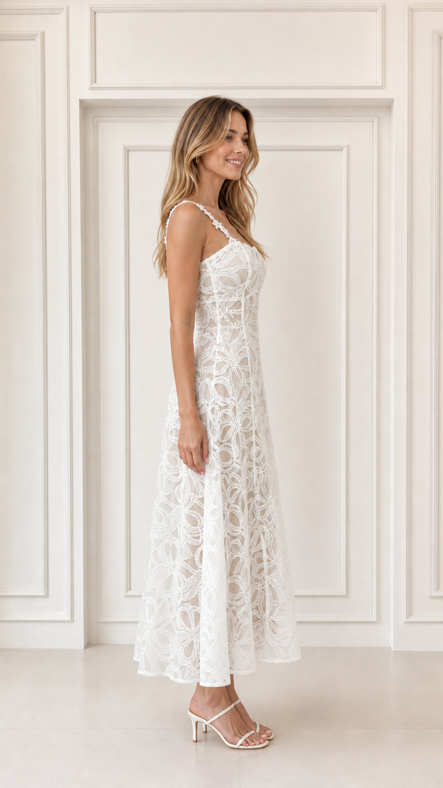Side view of woman in elegant white lace A-line midi dress