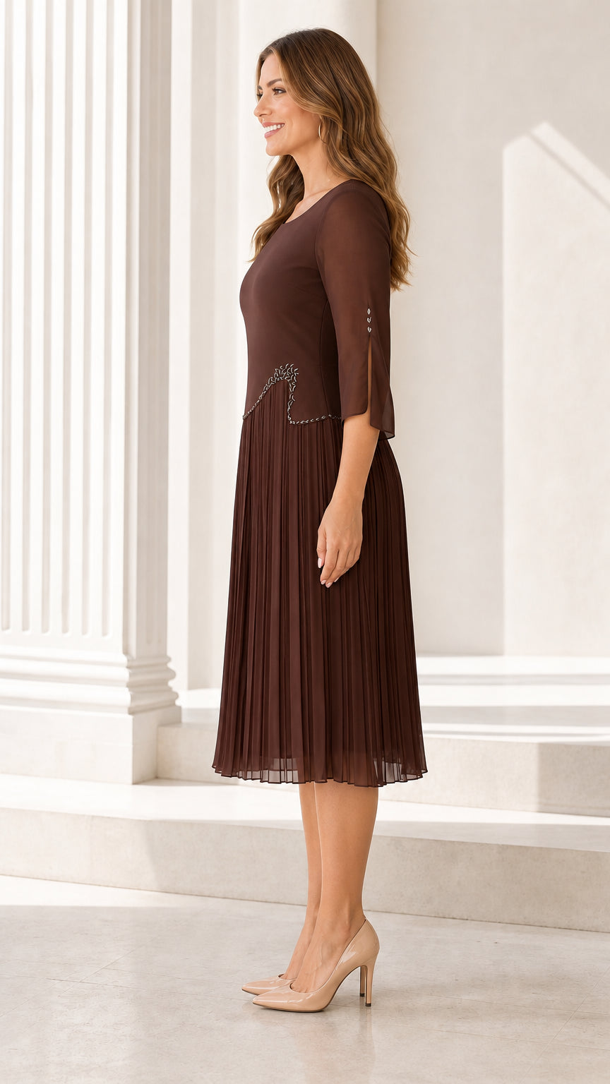 Side angle view of model wearing the Chocolate Brown 3/4 sleeve pleated midi dress