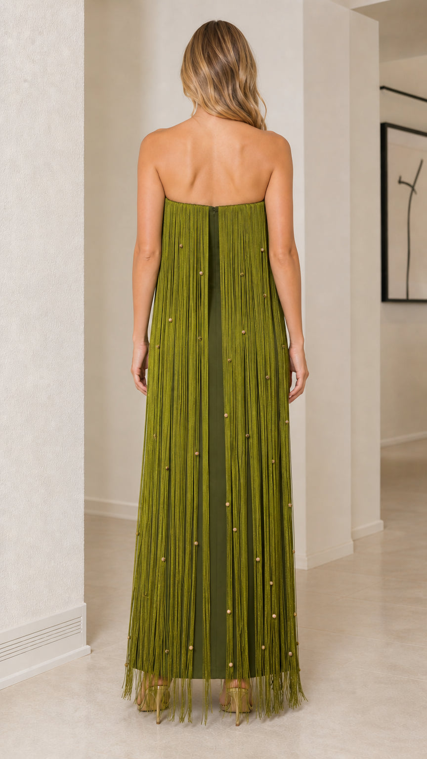 Back view of olive green strapless fringe maxi dress showing zipper closure