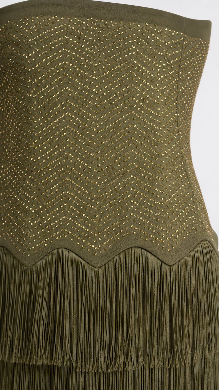Close-up of chevron rhinestone pattern and fringe trim on bodice
