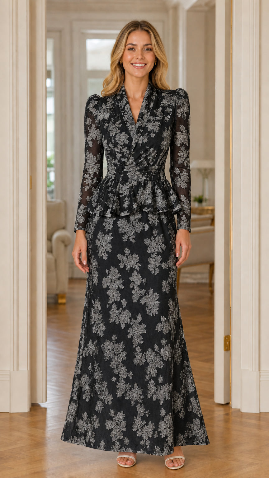 Front view of woman wearing black floral textured long sleeve peplum evening gown