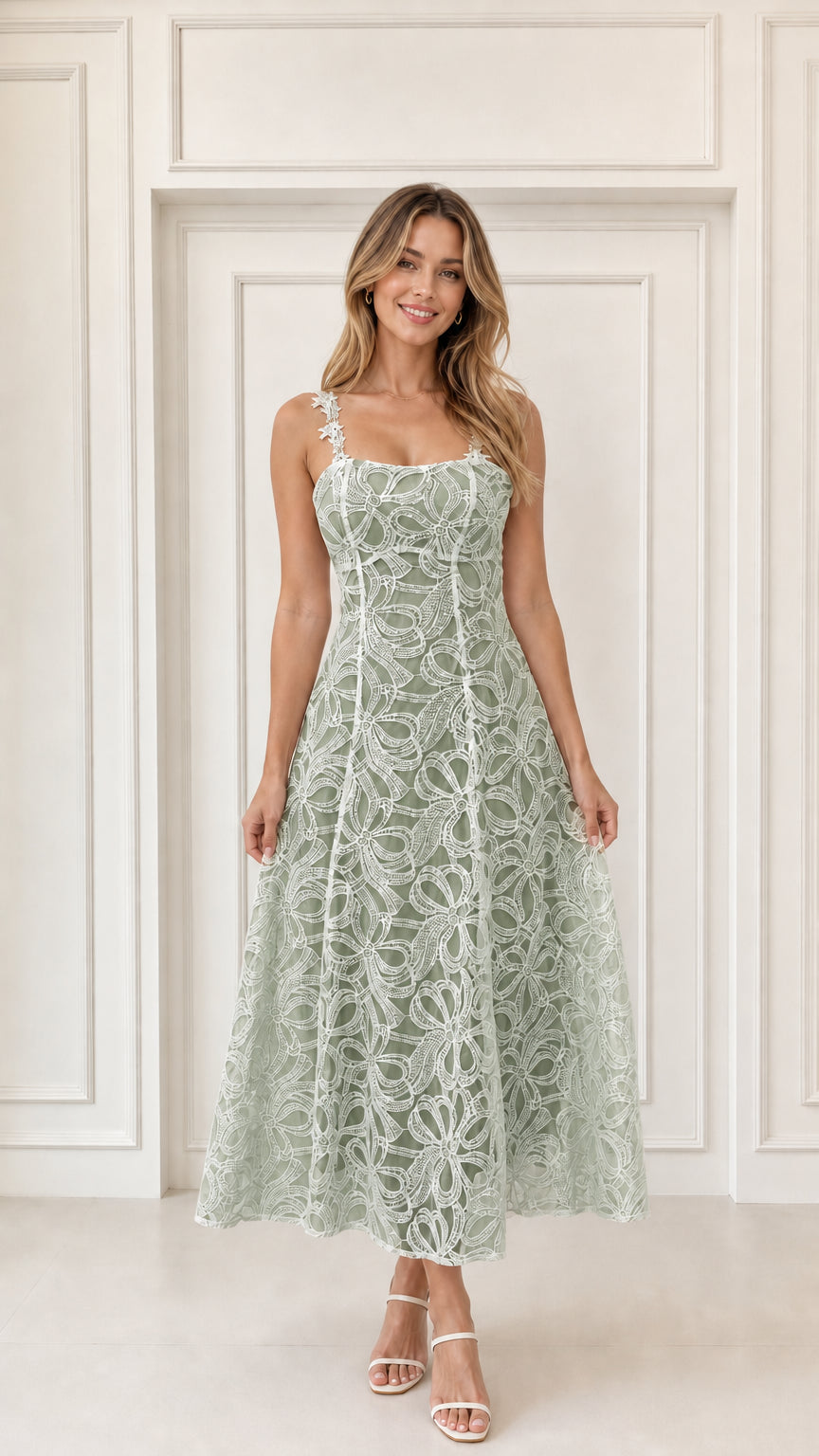 Woman wearing sage green embroidered lace A-line midi dress