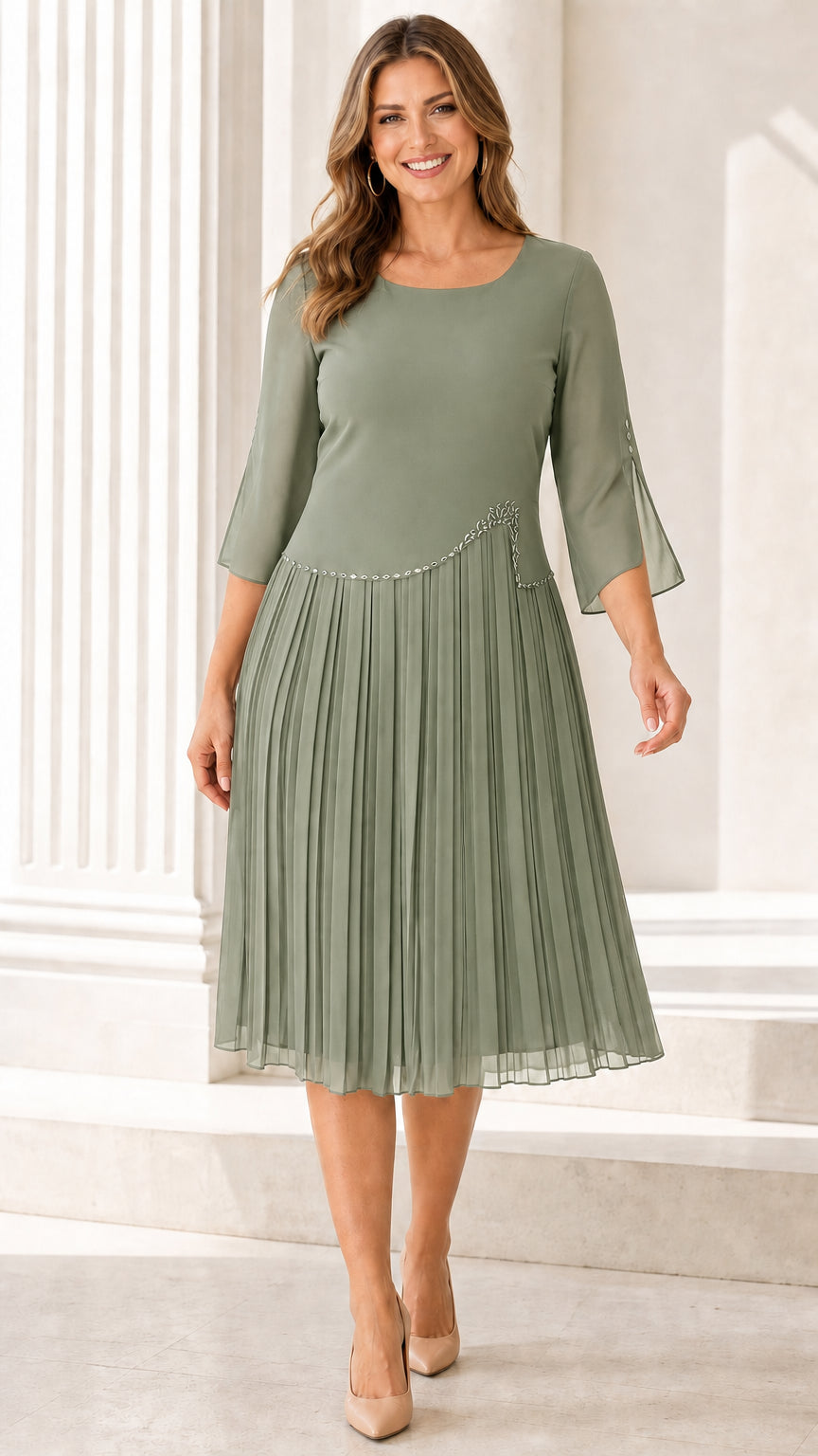 Full front view of model wearing the Sage Green pleated midi dress with sheer sleeves